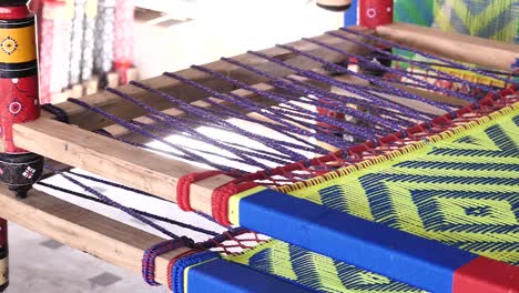 sideways-footage-with-detail-of-tools-used-for-traditional-hand-sewing-in-Pakistan