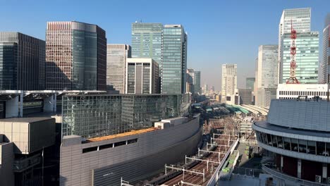 Tokyo-cityscape-with-modern-buildings,-clear-sky,-no-people,-daytime,-urban-architecture,-wide-shot