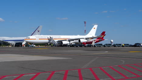 NATO-summit-representative-arrival-on-Bundesrepublik-Deutschland-Luftwaffe-aircraft-with-security-teams-parked-on-Vilnius-runway
