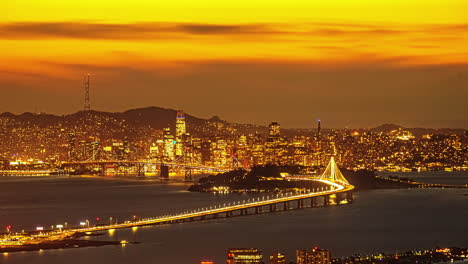 San-Francisco-Bay-Bridge-Oakland-California---sunset-to-nighttime-time-lapse