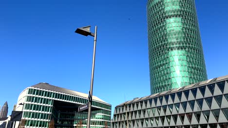 Modern-Westhafen-Tower-at-main-river-during-sunny-day-in-Frankfurt-City