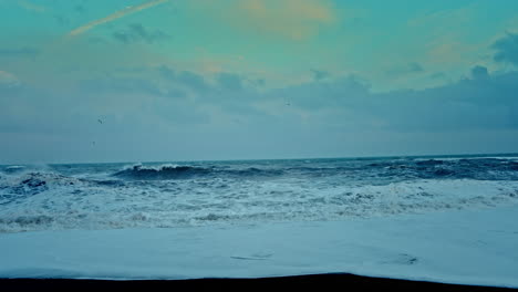 Rough-oceanic-waves-crushing-on-the-black-sand-beach