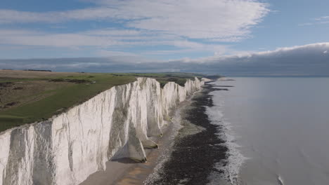 Revealing-aerial-slider-shot-of-the-seven-sisters-chalk-cliffs-on-the-south-coast-of-England