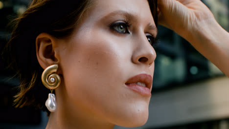 Close-up-view-of-elegant-woman-with-earrings