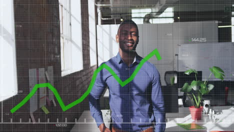 Animation-of-graphs-with-changing-numbers-over-african-american-man-standing-in-office