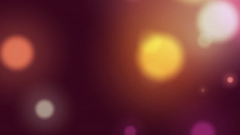 Animation-of-multicolored-lens-flares-over-black-background