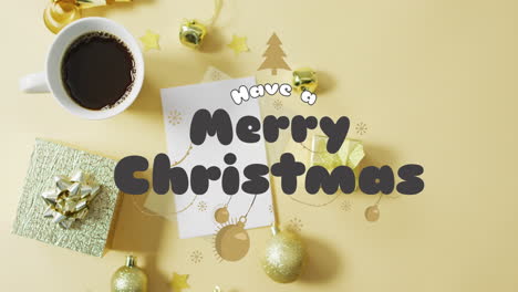 Animation-of-have-a-merry-christmas-text-and-christmas-decorations-with-gift-box-and-coffee-on-table