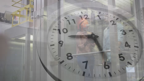 Animation-of-ticking-clock-against-diverse-man-and-woman-discussing-in-elevator-at-office