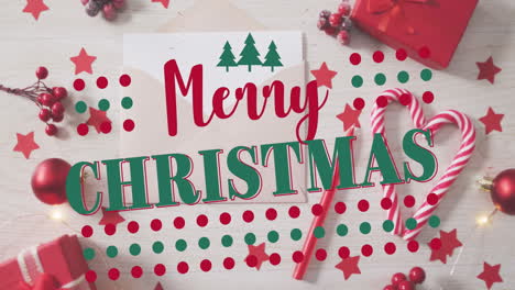 Animation-Eines-Frohe-Weihnachts-Textes-Mit-Baumsymbolen-Und-Punkten-über-Geschenkbox,-Kugeln,-Stöcken-Und-Sternen