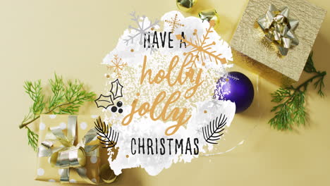 Animation-of-have-a-holly-jolly-christmas-text-and-christmas-decorations-and-gift-boxes