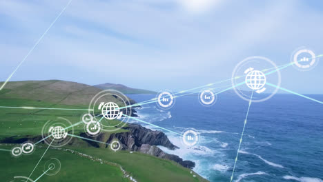 Animation-of-network-of-digital-icons-against-aerial-view-of-a-island-and-sea