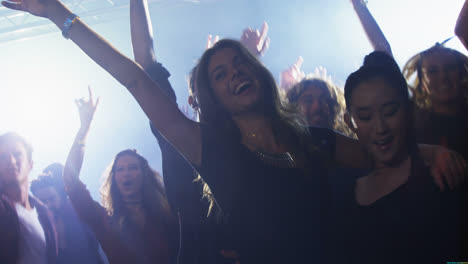 Group-of-people-dancing-at-a-concert-4k
