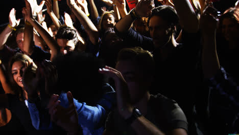 Group-of-people-dancing-at-a-concert-4k