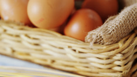 Close-up-of-brown-eggs-and-wheat-4k