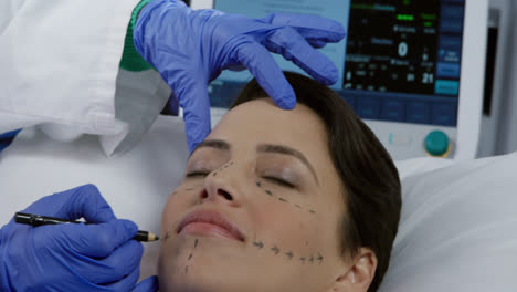 Patient-and-surgeon-during-a-cosmetic-procedure