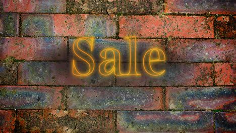 Yellow-neon-sale-sign-on-brick-wall