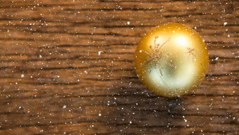 Falling-snow-with-Christmas-bauble-decoration