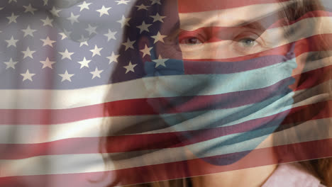 Woman-wearing-face-mask-against-US-flag-waving