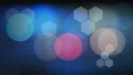 Animation-of-flickering-hexagons-and-spots-of-light-over-blue-grid