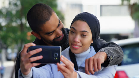 Couple-taking-selfie-with-mobile-phone-4k