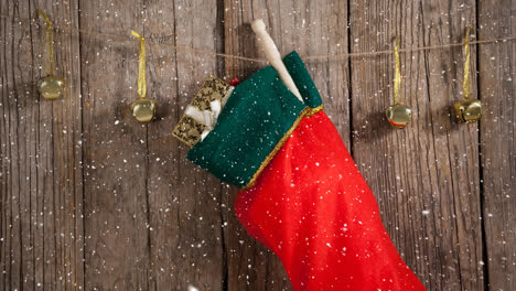 Falling-snow-with-Christmas-stocking