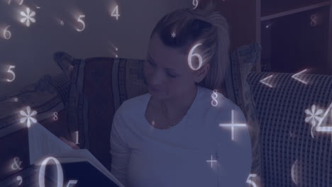 Animation-of-network-of-numbers-and-symbols-over-female-student-reading-a-book-from-home