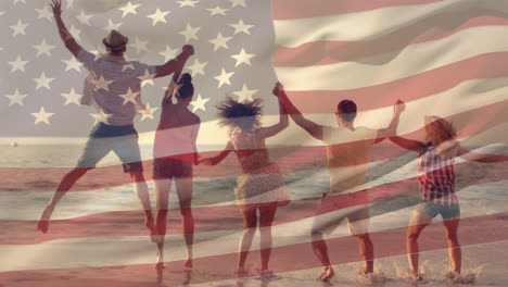 Group-of-friends-at-the-beach-and-the-American-flag-for-fourth-of-July.