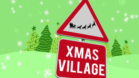 Santa-claus-in-sleigh-being-pulled-by-reindeers-and-xmas-village-text-on-signboard-against-snow-fall
