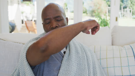 Senior-african-american-man-sneezing