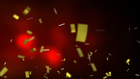 Animation-of-golden-confetti-falling-over-glowing-red-background