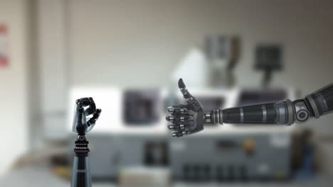 Robot-hands-and-blurred-industrial-background