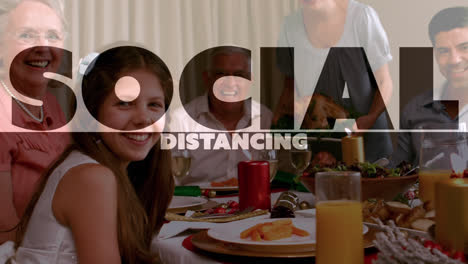 Social-distancing-text-against-three-generation-family-having-dinner