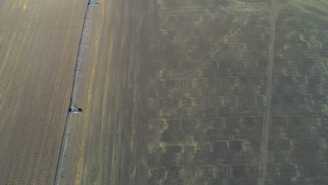 Aerial-view-of-power-plant-and-harvested-field-4k