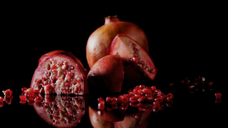Pomegranate-on-black-background-4k