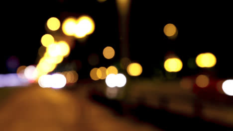 Colorful-bokeh-of-car-lights-on-the-street-at-night-4k