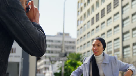 Man-taking-photo-of-woman-with-digital-camera-4k