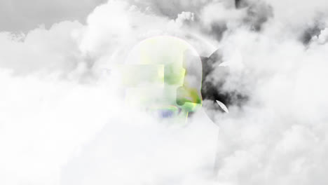 Animation-Von-Wolken-über-Einem-Digital-Zusammengesetzten,-Sich-Drehenden-Totenkopf