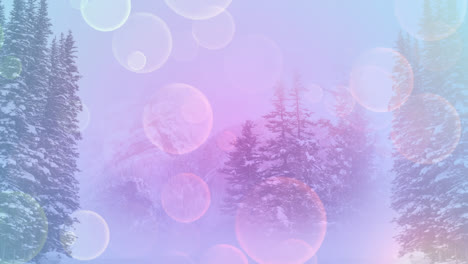 Digital-composition-of-purple-glowing-spots-of-light-against-snow-landscape-with-trees