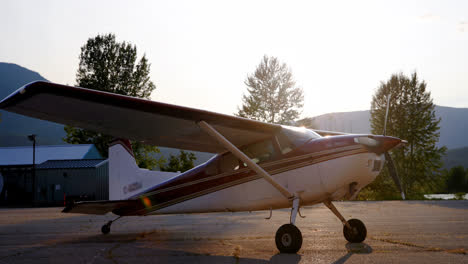 Aircraft-parked-near-hangar-4k