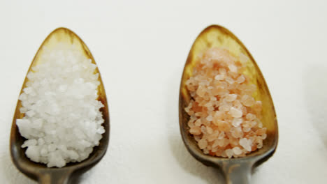 Various-types-of-sea-salt-in-a-spoon-4k