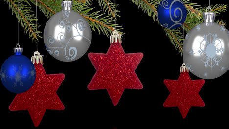 Animation-of-christmas-blue-and-silver-baubles-and-red-star-decorations-hanging-from-fir-tree
