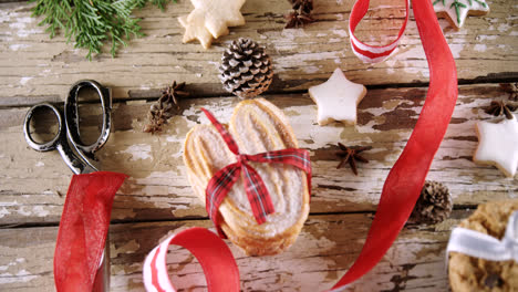 Süßes-Essen-Und-Weihnachtsdekoration-Auf-Holztisch-4k