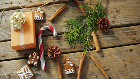 Christmas-cookies-and-various-decorations-on-wooden-table-4k