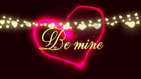 „Be-Mine“-Geschrieben-In-Rosa-Leuchtendem-Herz-Mit-Herzförmigen-Lichterketten-Auf-Schwarzem-Hintergrund