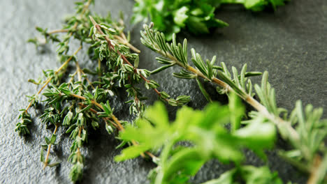 Various-type-of-herbs--on-black-background-4k