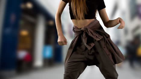 Woman-dancing-against-street-in-background