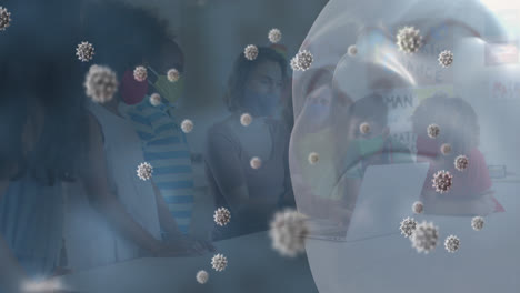 Animation-of-coronavirus-cells-and-model-head-with-teacher-and-schoolchildren-wearing-face-masks