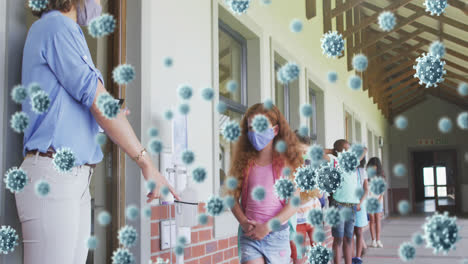 Animation-of-coronavirus-cells-with-masked-schoolchildren-sanitizing-hands-before-class