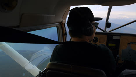 Pilot-flying-aircraft-in-cockpit-4k