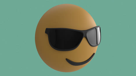 Sonnenbrillen-Gesicht-Emoji-über-Boom-Text-Auf-Sprechblase-Vor-Grünem-Hintergrund